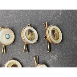 Set of six early 20th century gold plated portrait buttons, mounted with sepia photographic images of an Edwardian lady, in mother of pearl border, together with a set of five early 20th century mother of pearl buttons with turquoise centre, and one other similar button, largest D14mm