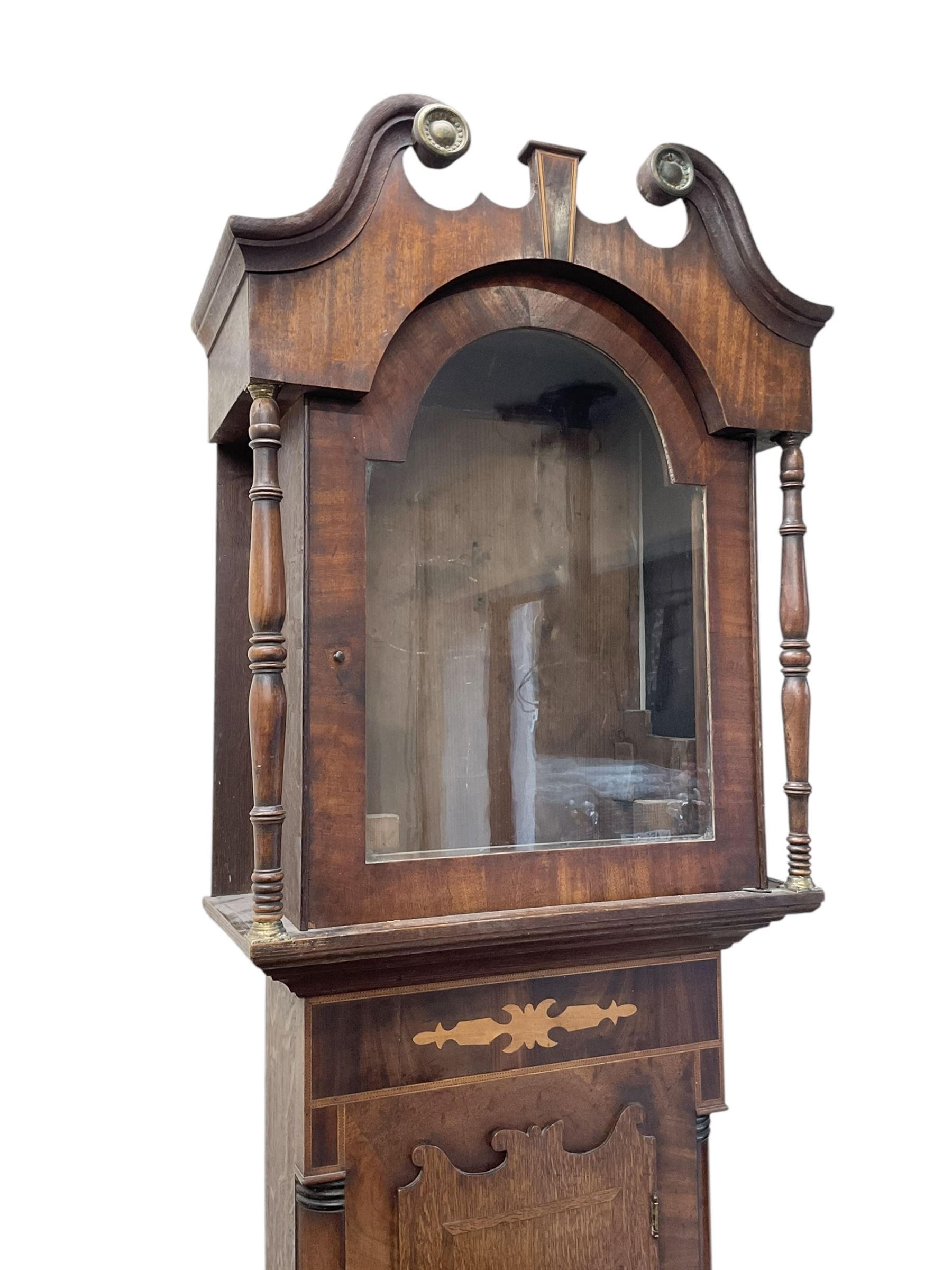D Hudson of Otley - late 19th century 30 hour oak and mahogany longcase clock, with a swan necked pediment, break arch hood door and ring turned pilasters, inlaid trunk with recessed columns and a short trunk door with inlay and a bone escutcheon, rectangular conforming plinth with a shaped base,  painted dial with geometric spandrels and a depiction of  Britannia to the arch, broad Roman numerals, makers name and calendar dial, dial pinned directly to a chain driven countwheel striking movement, striking the hours on a bell. with pendulum. No weight or movement seat board.