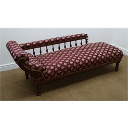 Edwardian three piece salon suite comprising: walnut framed chaise longue, upholstered in a maroon and gold patterned fabric, gallery back, turned supports (L180cm) and pair Ladies and Gents upholstered armchairs (3)  