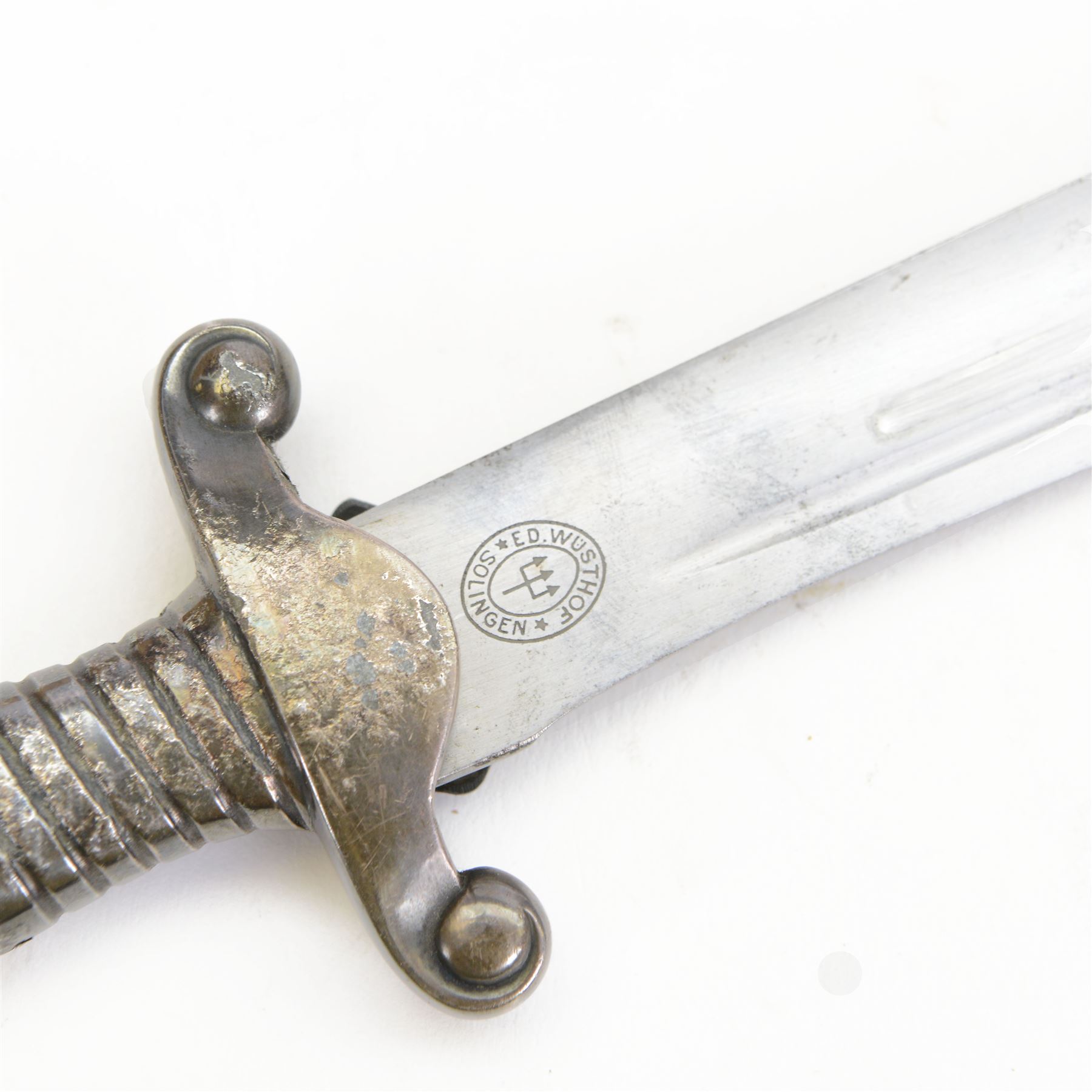 German Third Reich Officers dress hewer, the 26cm blade marked 'Urbeit adelt', the crossguard with RAD badge, ivorine grip and eagle head pommel, in engraved metal scabbard, overall L40cm