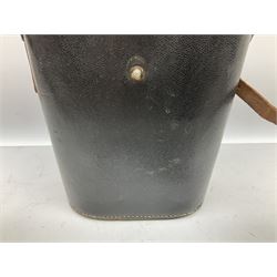 Pair of WWII German U-boat binoculars probably 7 x 50 by Leitz, with rubber eye piece protector covers and leather case stamped with Kriegsmarine mark to the lid and dated 1944, with leather strap.