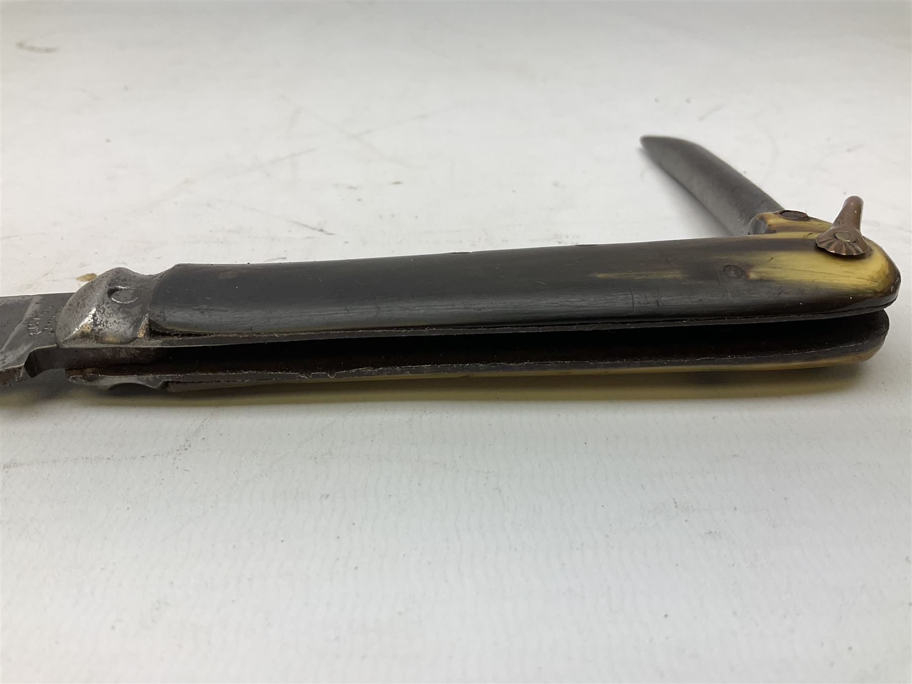 Early 20th century Royal Garrison Artillery Orkney army folding jack/clasp knife, the blade inscribed 'Orkney R.G.A.(T) and marked F. Newton Premier Sheffield, with blade and marlin spike and horn grips