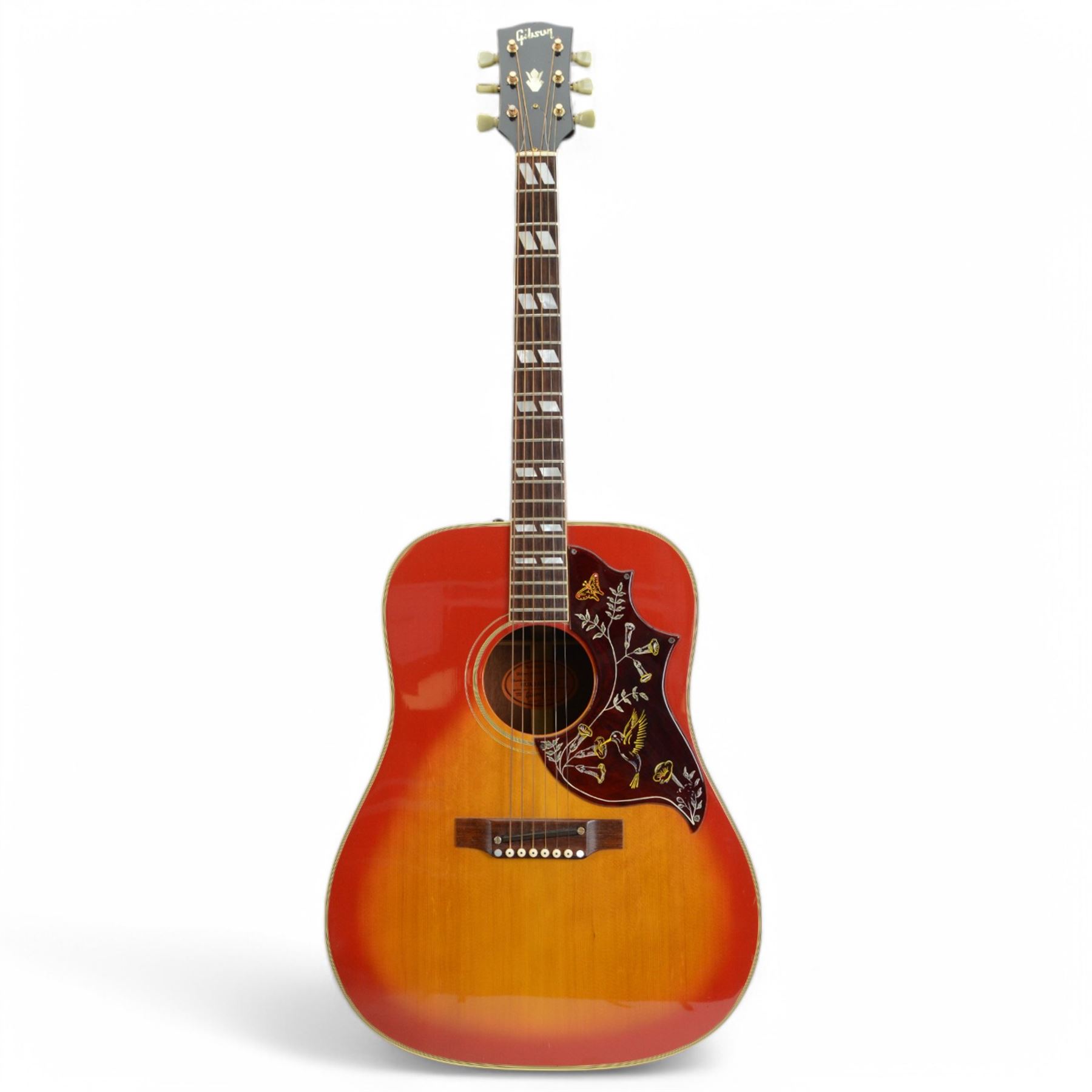 1968 Gibson Hummingbird acoustic guitar, with sunburst finish, serial no. 500460, inlaid mother of pearl fret markers, inlaid pick guard, bound fingerboard and sides, original adjustable bridge, original tuning pegs, contained within hard case, guitar length 104cm