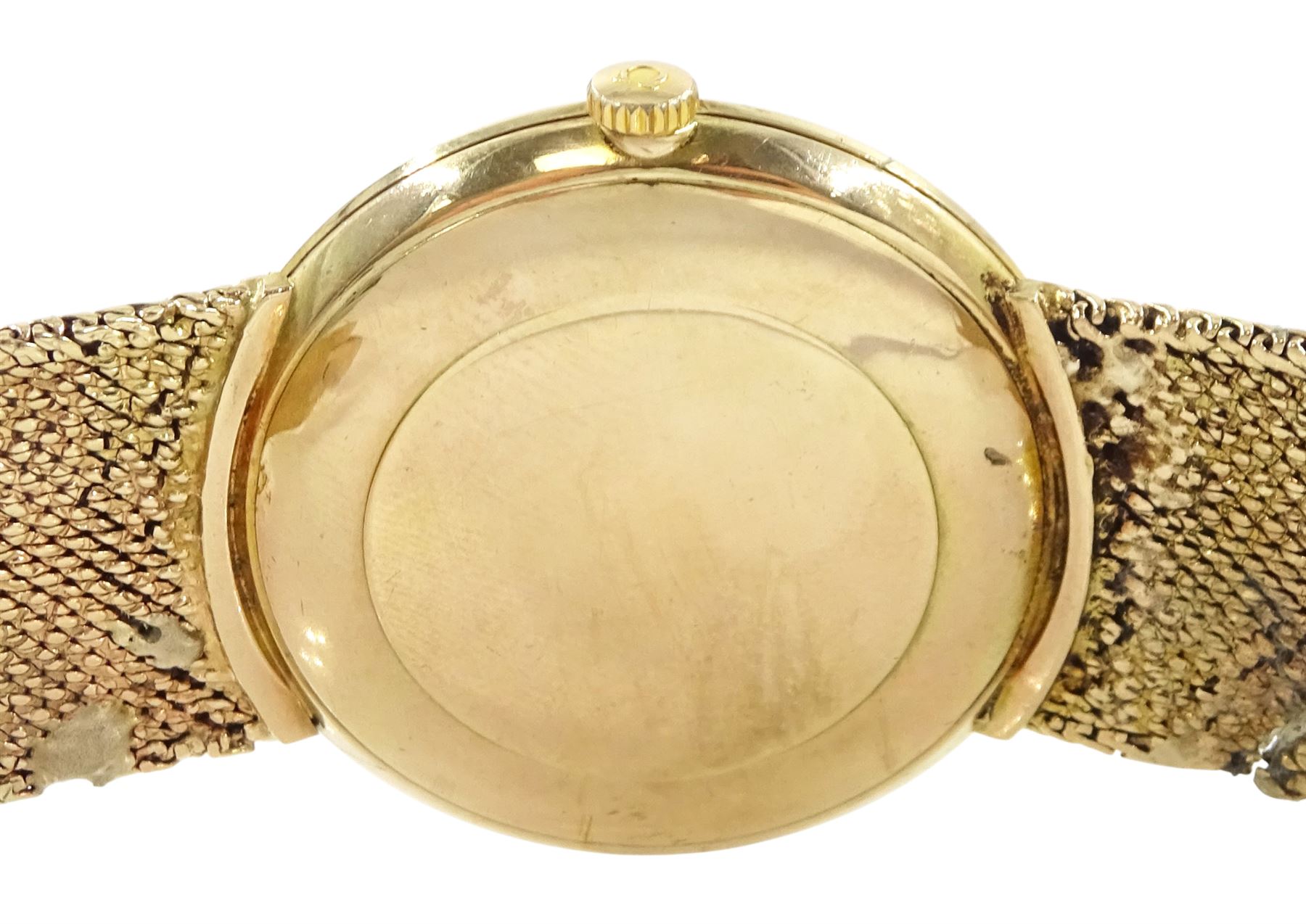 Omega gentleman's 9ct gold manual wind wristwatch, Cal. 601, silvered dial with baton hour markers, London 1969, on integral 9ct gold strap, hallmarked