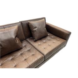 Ralph Lauren - three seat sofa, upholstered in buttoned brown leather with additional cushions, on turned brushed metal feet