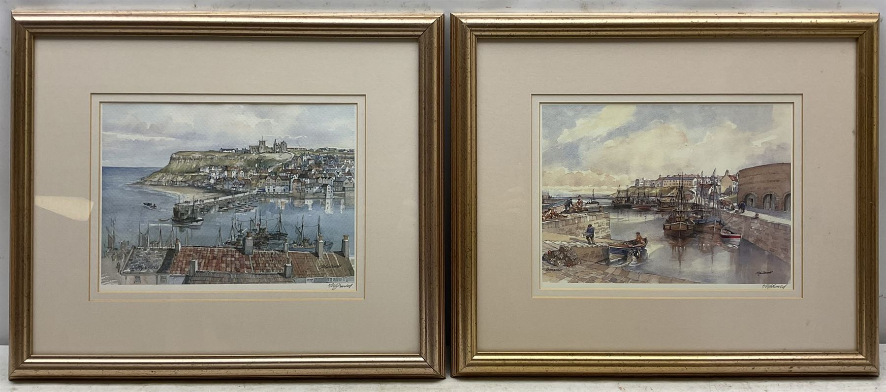 J MacDonald (British Contemporary): 'Whitby' and 'Seahouses', pair colour prints signed in pencil 22cm x 30cm (2)