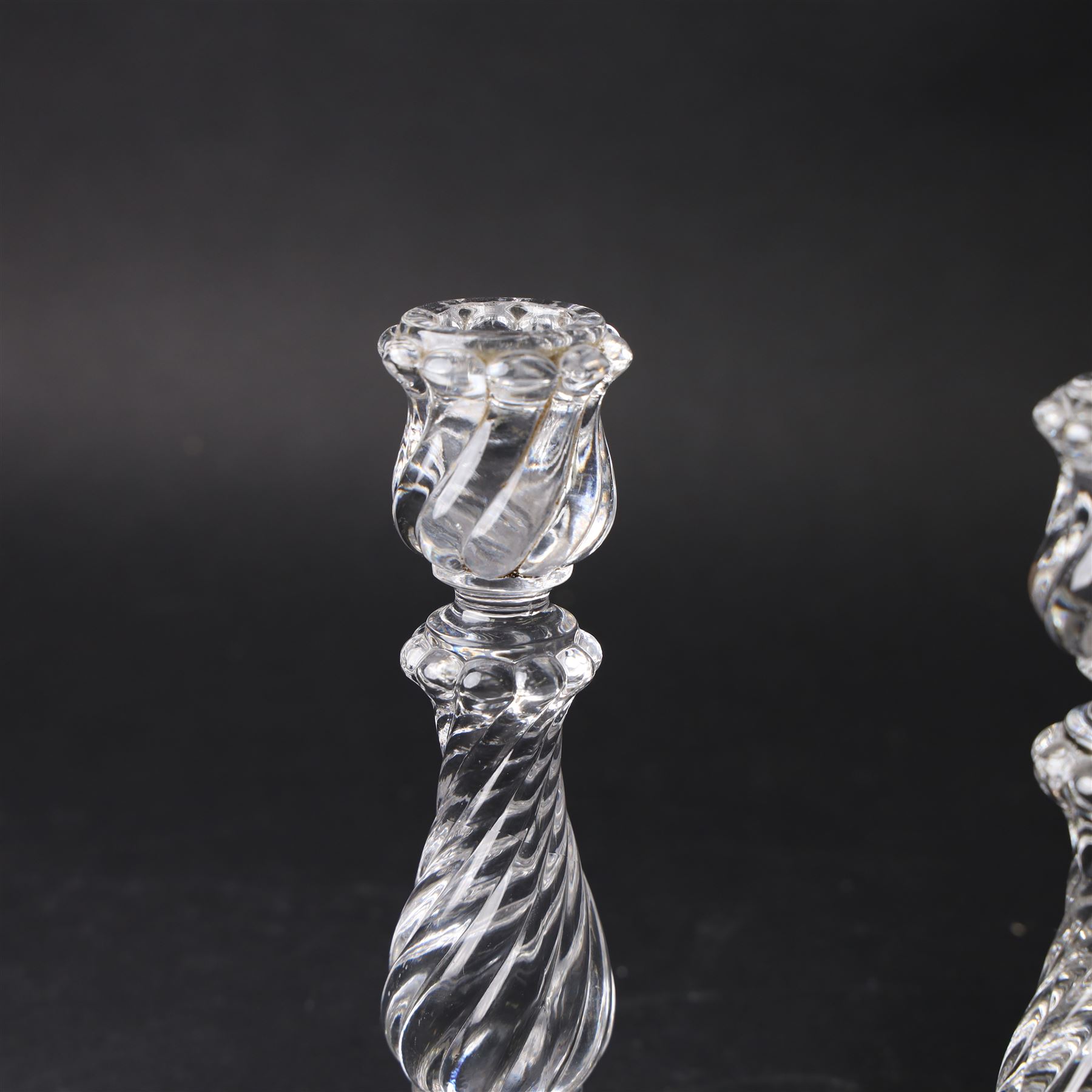Pair of Baccarat Bambous glass candlesticks, with wrythen moulding, marked beneath, H19cm