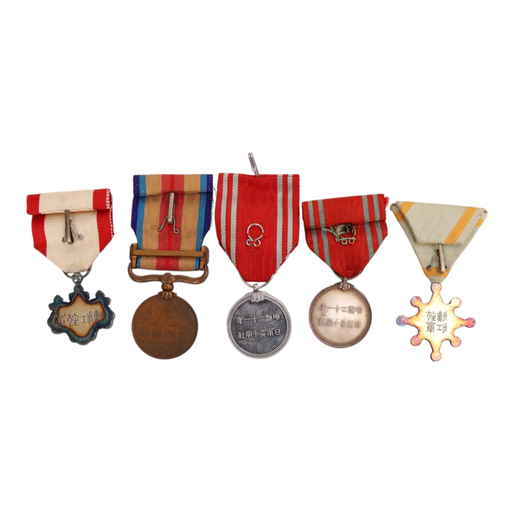 Five Japanese medals, including Order of the Sacred treasure, Order of Rising Sun, two Red Cross medals and Incident war medal  