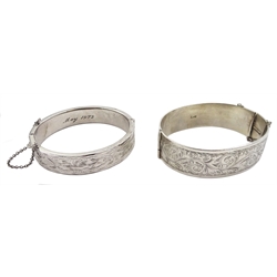 Silver bangle by Henry Griffith & Sons Ltd, Birmingham 1957, three other silver bangles stamped or hallmarked and a silver purse by Ellis Bros, stamped sterling