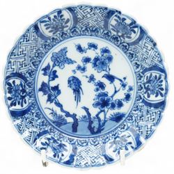Set of six Chinese blue and white saucers, mostly Kangxi period, comprising matching pair decorated with insects and birds, example with painted lions and tigers, four bearing blue painted 'lingzhi' fungus mark to base, the others unmarked (6)