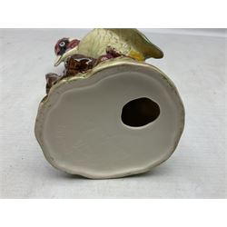 Three Beswick figures of birds, comprising pheasant no 1225, magpie no 2305 and woodpecker 1218, all with impressed marks beneath, tallest H22cm