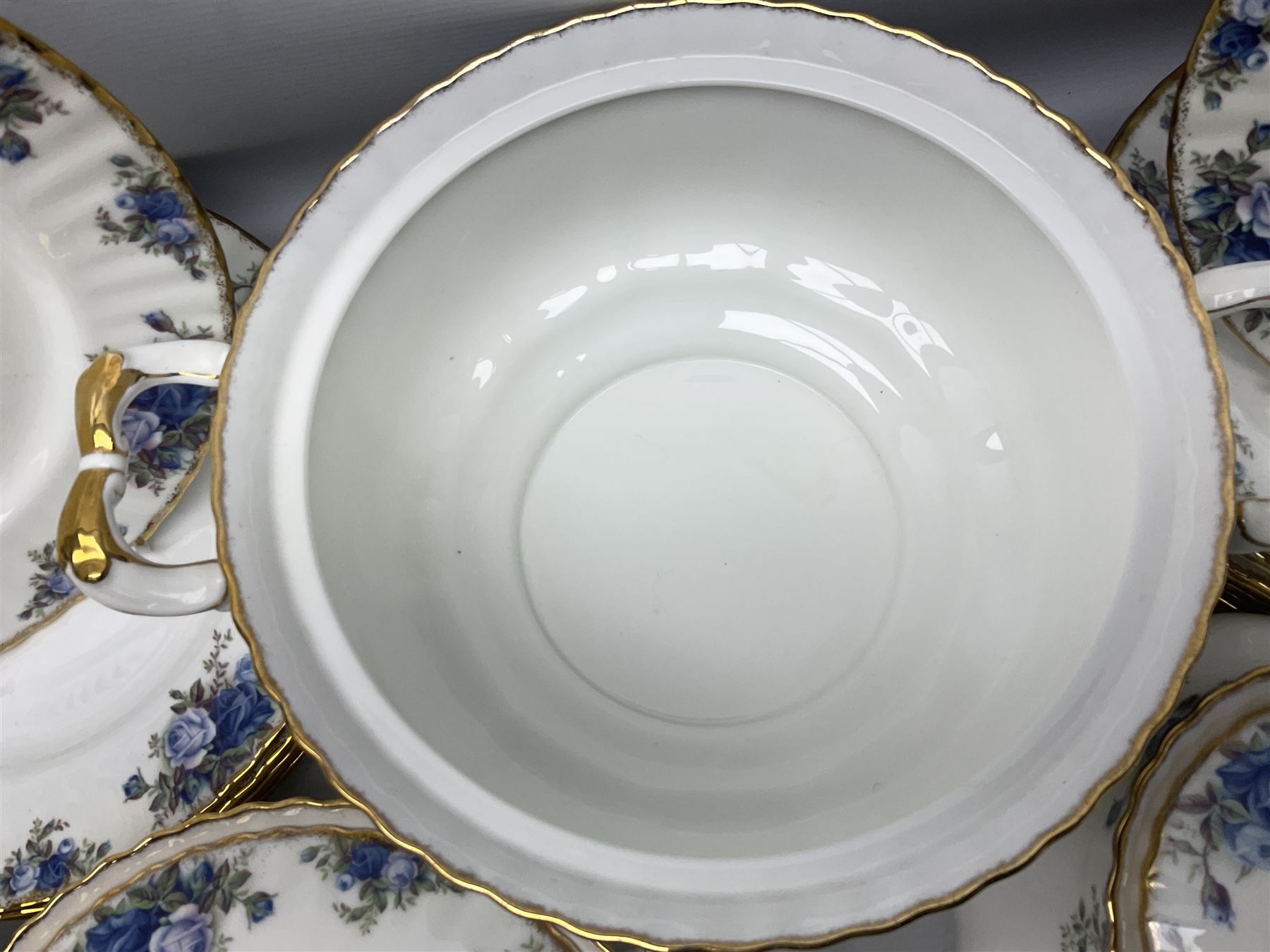 Royal Albert Moonlight Rose pattern dinner service for six, to include, dinner plates, bowls, soup bowls, twin handled soup bowls with saucers, twelve side plates, twin handled soup tureen with cover, twin handled serving dish and cover, sauce boat and saucer, teapot and warmer etc (51)