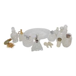 Collection of cut glass scent bottles including Art Deco examples and a cut glass tray