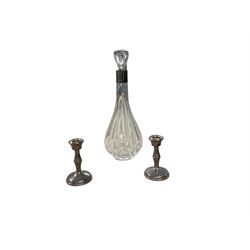 Silver collar decanter together with two silver candlesticks 