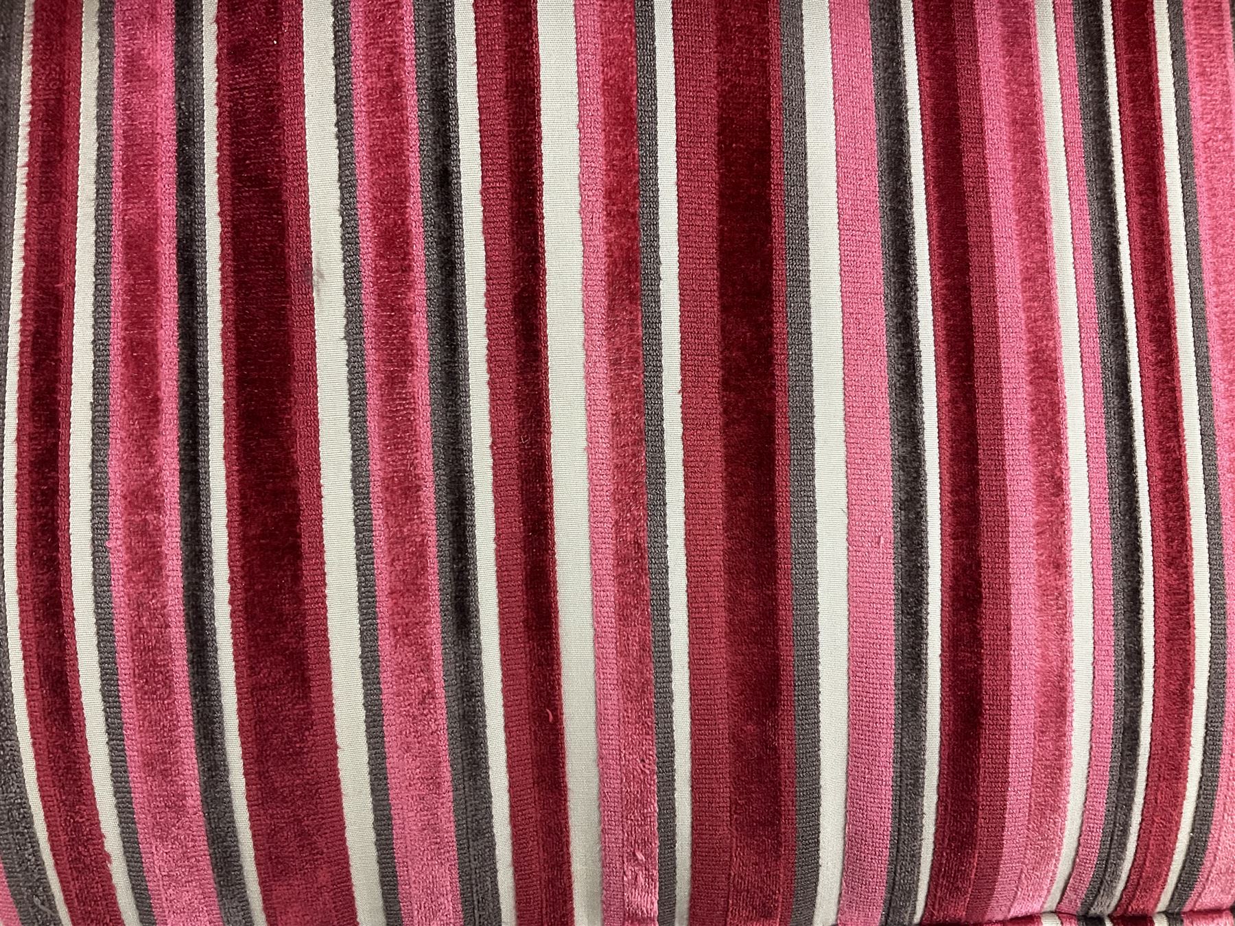 Collins & Hayes - grande three seat sofa upholstered in chocolate fabric, the loose cushions upholstered in textured fuschia stripes with contrasting spotted bolster cushions