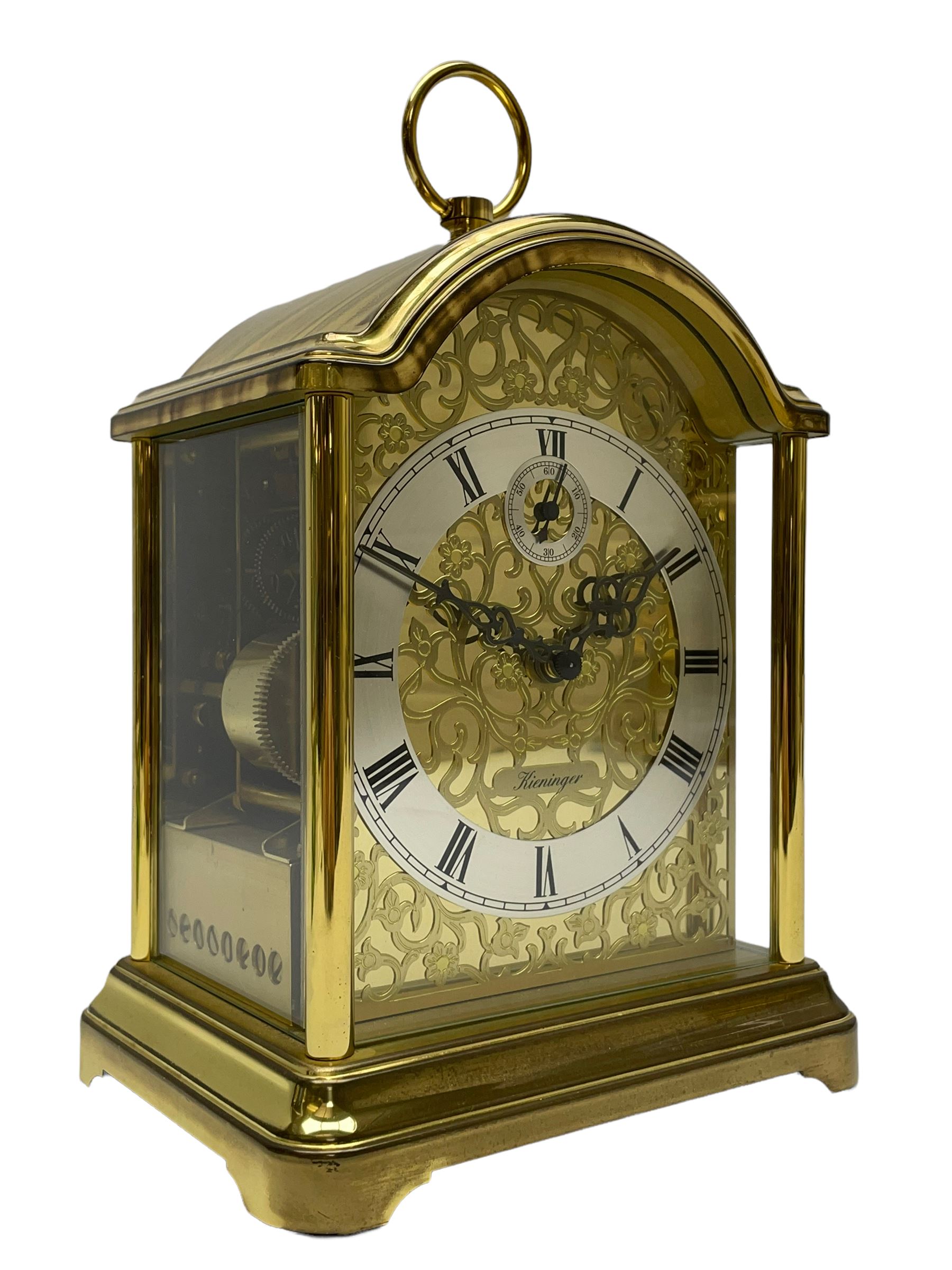 A 20th century brass cased Kieninger (German) chiming mantle clock with