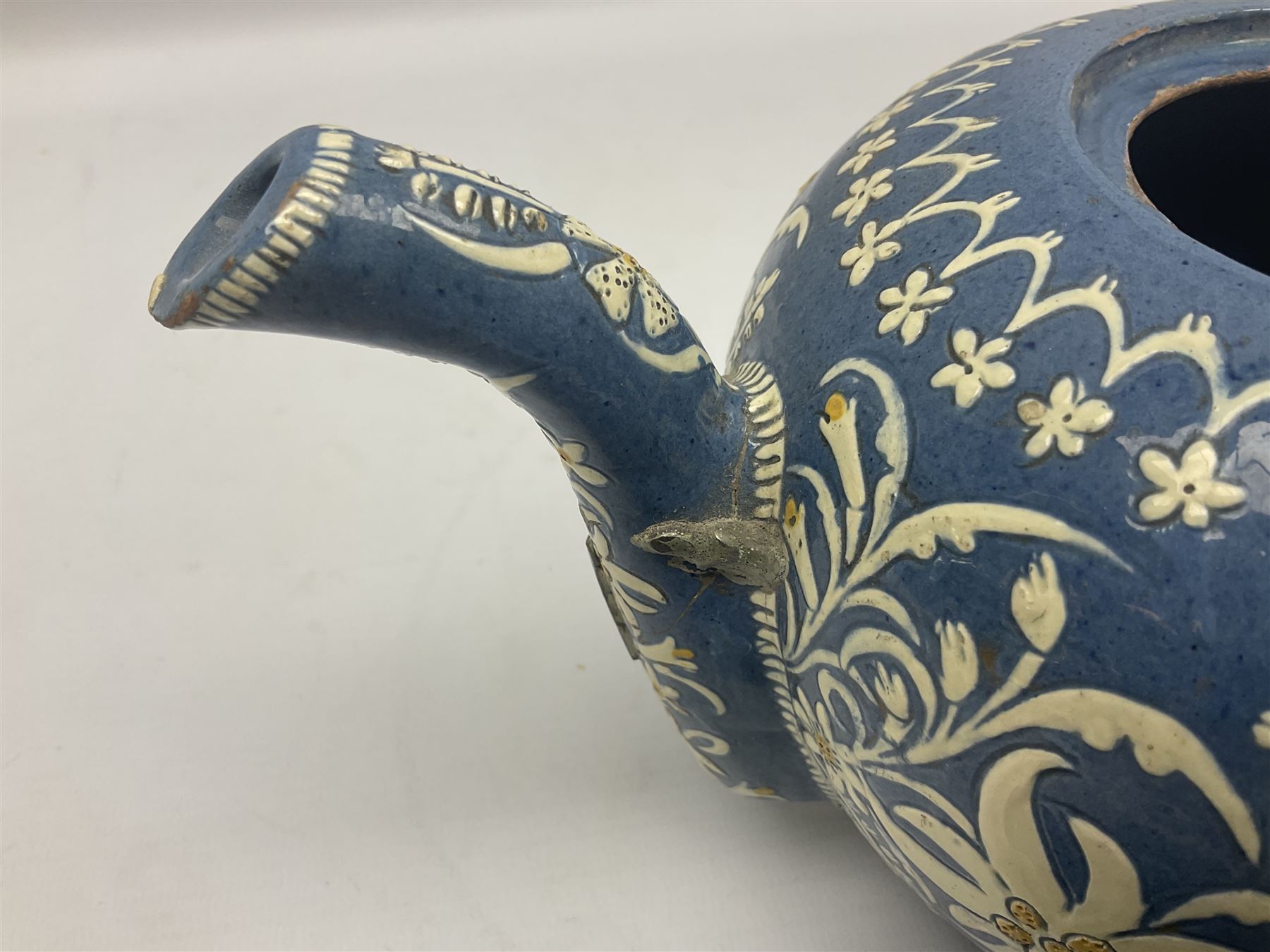 Swiss Thun pottery teapot and cover, decorated with edelweiss flowers, H16cm