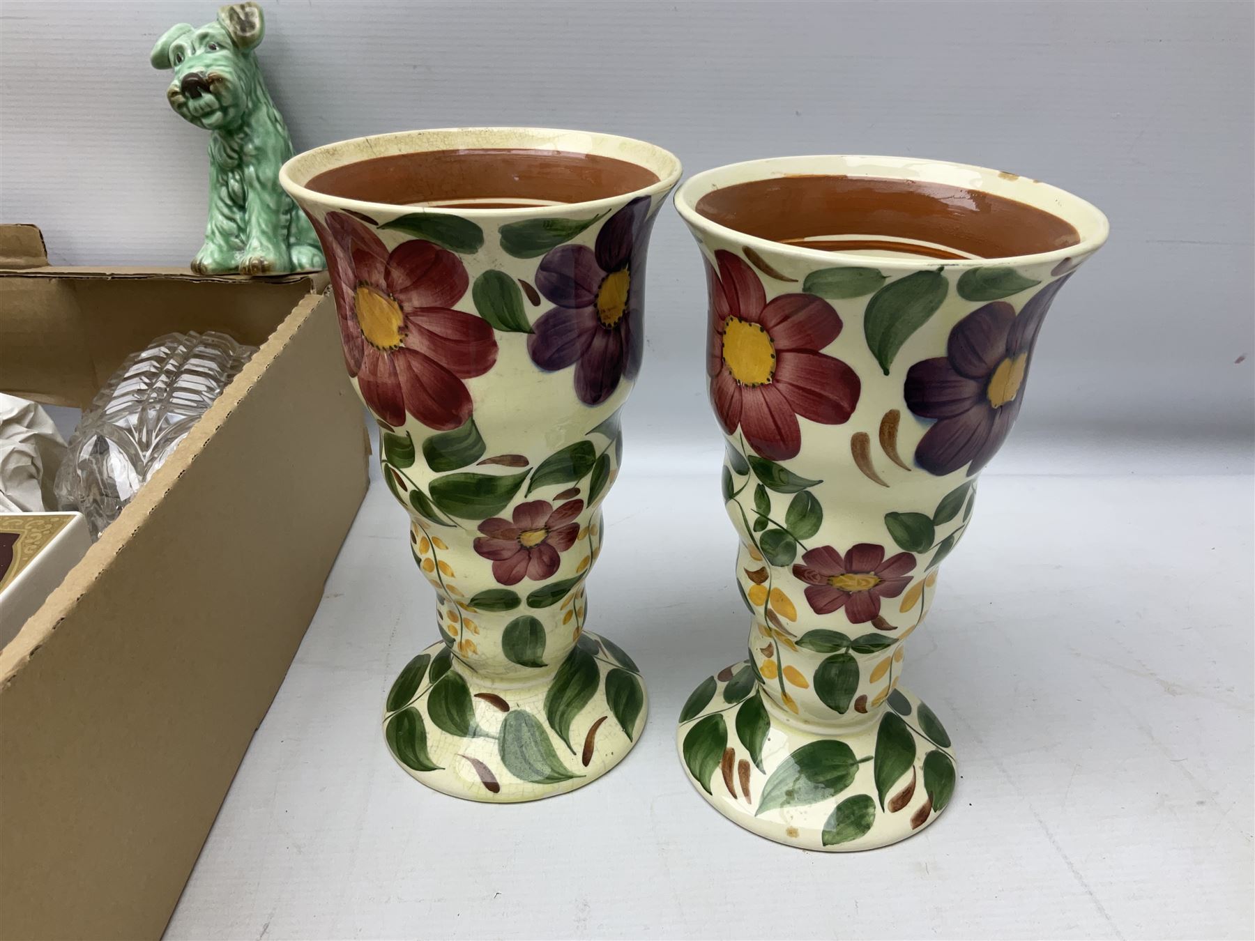 Sylvac green seated dog, together with pair Wade Heath vases, wall charger and other collectables, in two boxes  