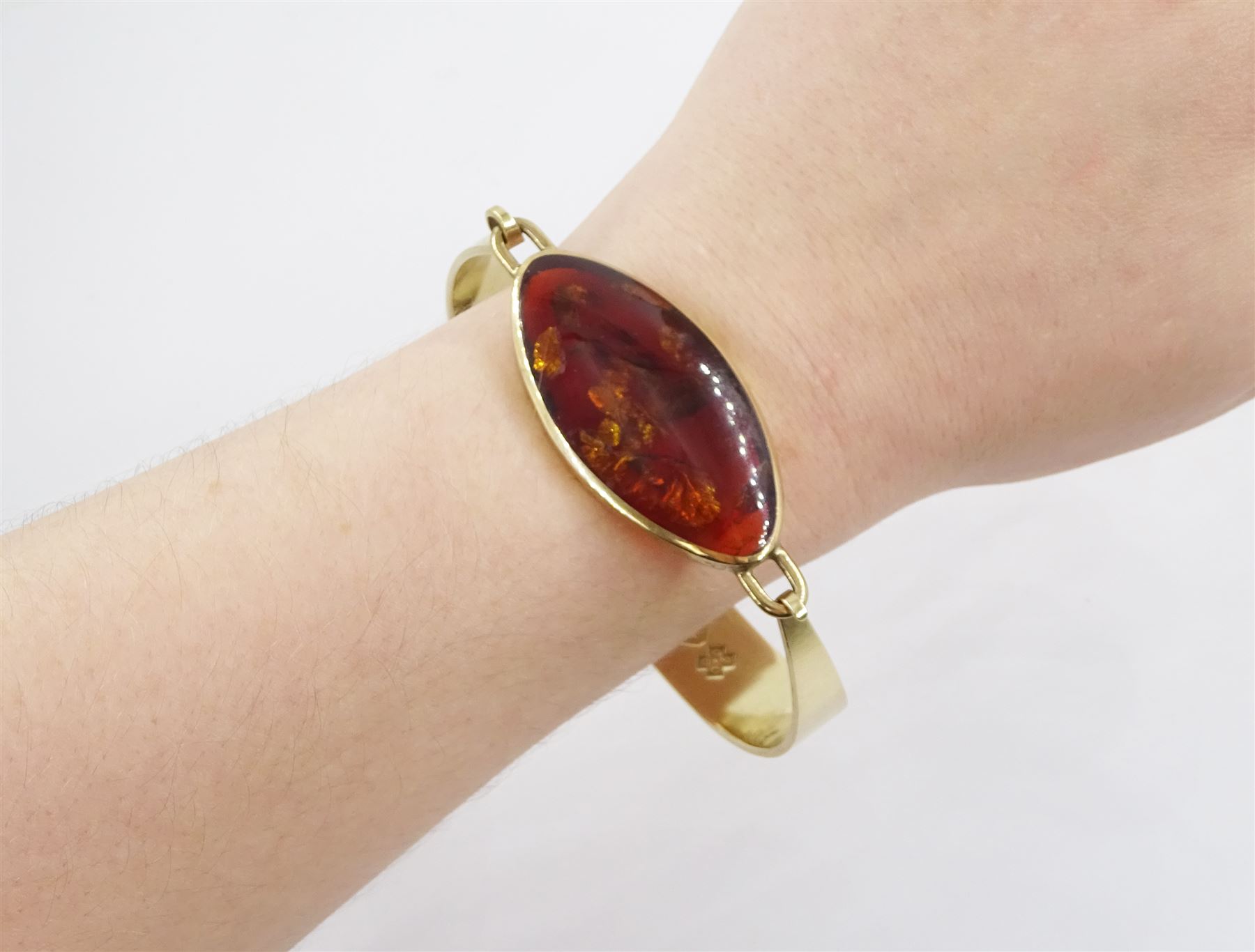 9ct gold oval amber wide bangle by C W Sellors, Sheffield 1999