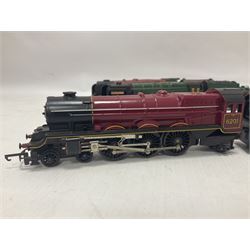Hornby ‘00’ gauge - four steam locomotives comprising Britannia Class ‘Britannia’ 4-6-2 no.70000 in BR green; Britannia Class ‘Oliver Cromwell’ 4-6-2 no.70013 in BR green; Princess Class 4-6-2 no.6201 in LMS crimson; Coronation Class ‘Duchess of Sutherland’ 4-6-2 no.6233 in LMS crimson; one further tender (5) 