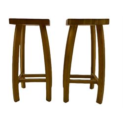 Pair light oak bar stools with dished seats