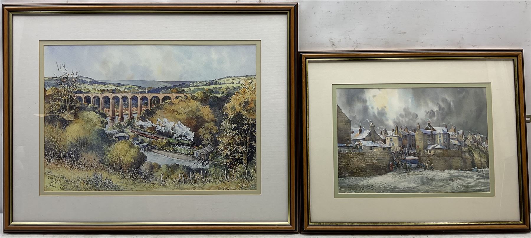 John Freeman (British 1942-): 'Whitby Viaduct' and Launching the Lifeboat 'Robin Hood's Bay', pair limited edition prints signed and numbered 6/500 and 28/850, respectively, 34cm x 49cm and 24cm x 35cm