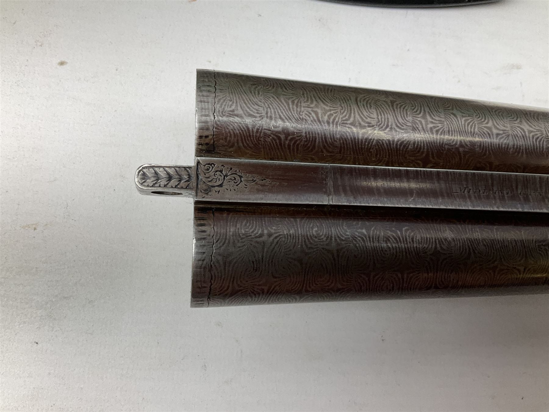 Midland Gun Company Birmingham & London 12-bore side-by-side box-lock non-ejector double barrel shotgun with 76cm damascus barrels, Prince of Wales style walnut stock with chequered grip and fore-end, top safety and engraved lock no.62160 L120cm overall; in scratch built baize lined wooden case. SHOTGUN CERTIFICATE REQUIRED.