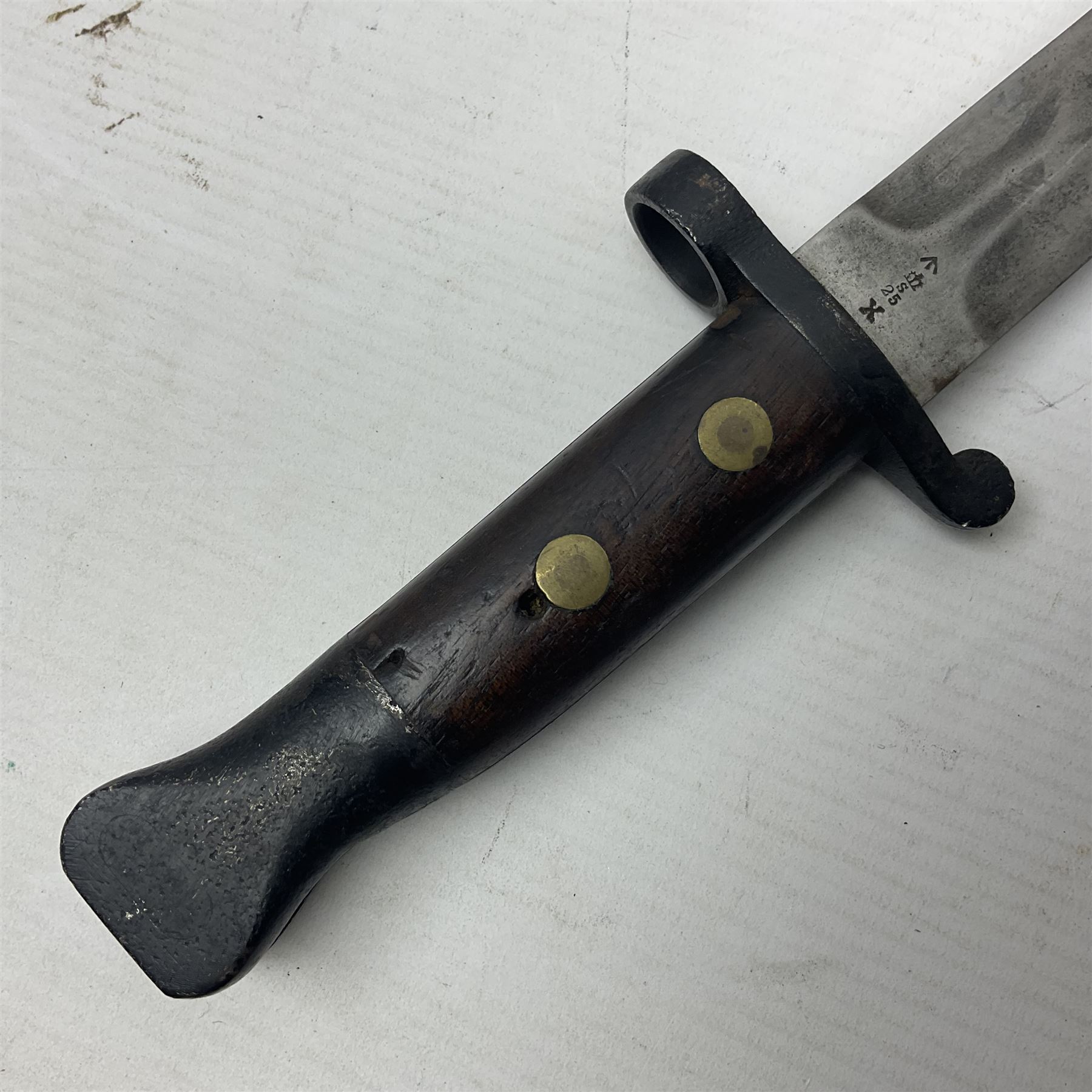 British Pattern 1888 knife bayonet, the 30cm double edged blade by Sanderson with central raised medial ridge and various marks to the ricasso including date code 12 98; in leather covered scabbard with various stamped marks L44cm overall