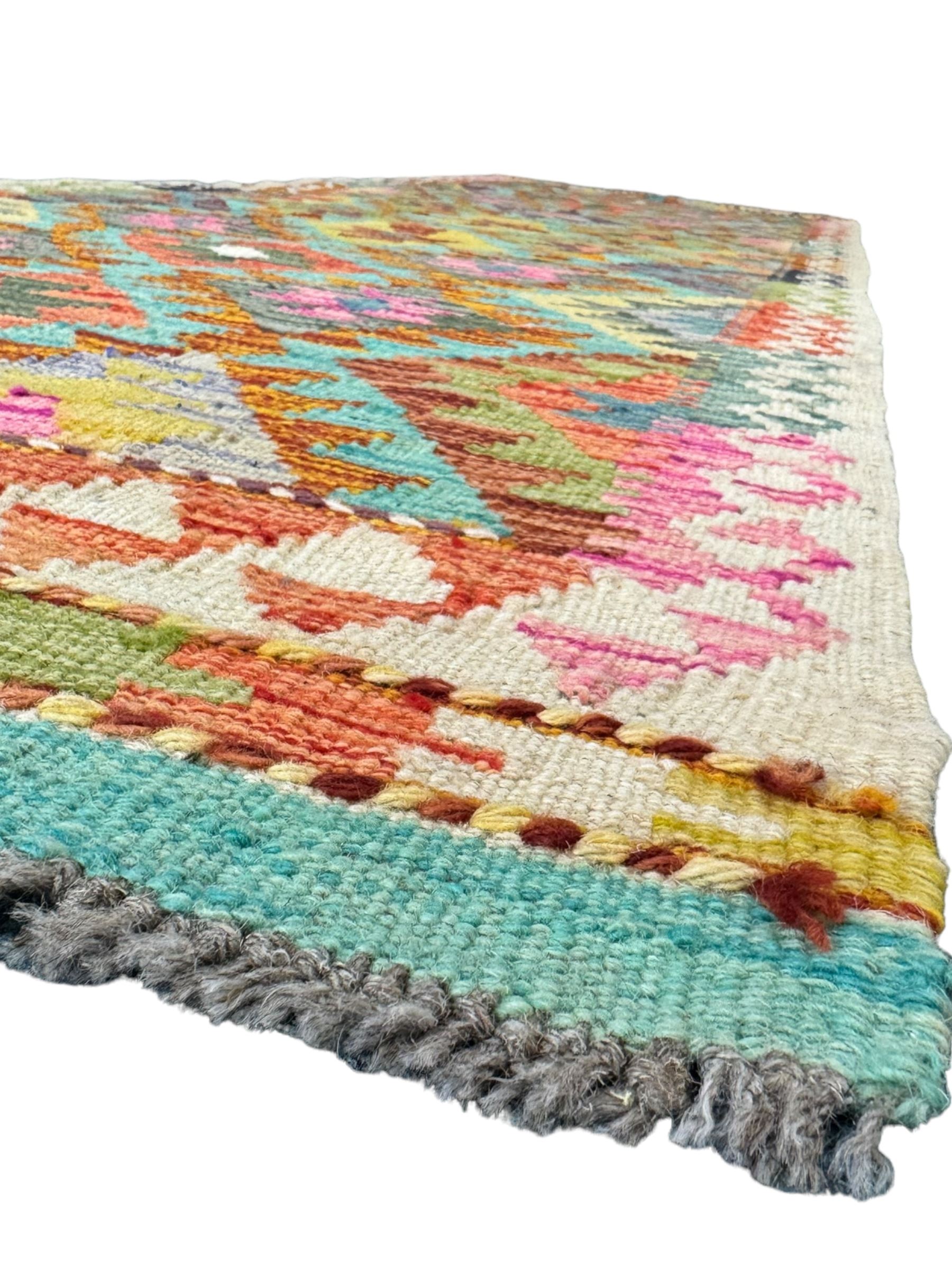 Tibetan-design handwoven rug, deep red field with three central medallions in yellow and blue, traditional yellow key border, white fringes on both ends