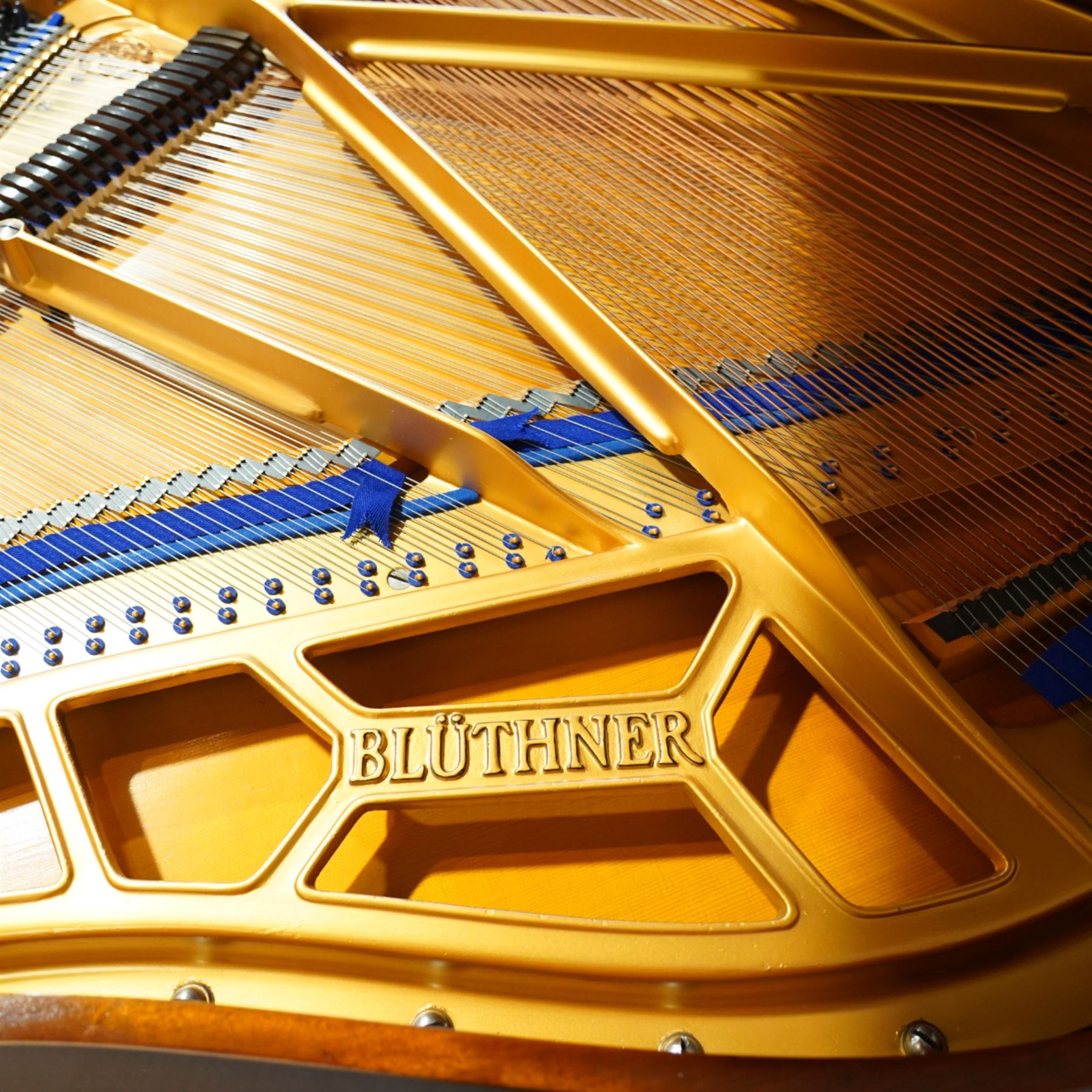 Julius Bluthner-light mahogany overstrung Baby Grand Piano serial No 118183 (1934), with a grand roller action, 88 ivory and ebony keys AO-C7, raised on three square tapered legs with brass castors, adjustable music desk and Lyre with sustain and una-corda pedals, recently (2007) thoroughly restored, case re-finished and polished, action completely overhauled and adjusted with good repetition, frame totally re-strung including copper wound bass strings, new tuning pins, hammer heads, dampers and traditional blue Bluthner string felt, in very good playing condition. With a matching adjustable piano stool fitted with a leather cover. Tuned to concert pitch, A=440.  Complete with key fall lock and key and three castor cups.
This item has been registered for sale under section 10 of the APHA Ivory Act, Reference X76CPCS8