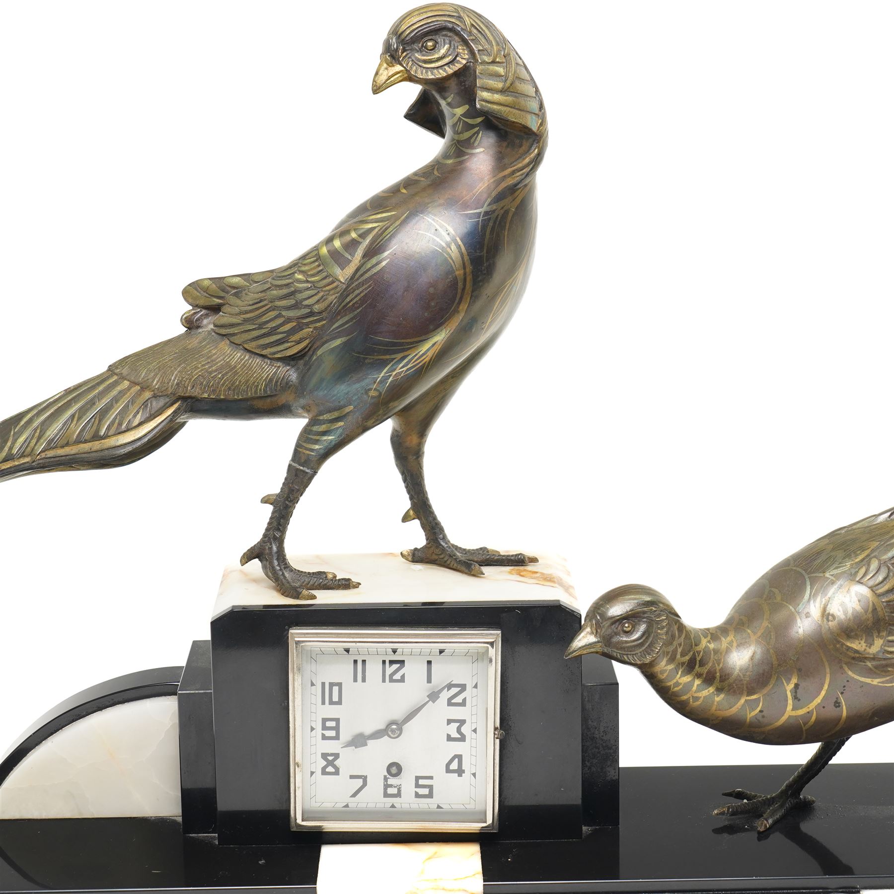 French- Early 20th century Art Deco mantel clock with an 8-day timepiece movement, on a polished rectangular slate base, with inset cream onyx panels, surmounted by a pair of highly decorative bronze effect pheasants, square 4