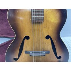 1950s Framus arch top acoustic guitar with sunburst finish and Framus logo to top, No.1937 L104cm; in hard carry case.