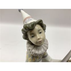 Lladro Young Jester set, comprising Mandolin no 6237, Trumpet no 6238 and Singer no 6239, all with original boxes, largest example H22cm