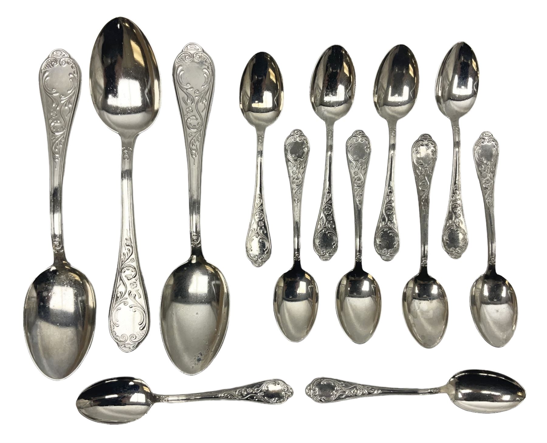 White metal flatware, comprising three table spoons, and ten teaspoons, marked 800, approximate weight 289 grams