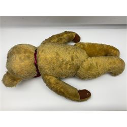 Large post-war Chad Valley plush covered teddy bear with revolving head, applied eyes, vertically stitched nose and mouth, jointed limbs and growler mechanism; stitched label to right foot and Hygenic Toys label to right side H73cm