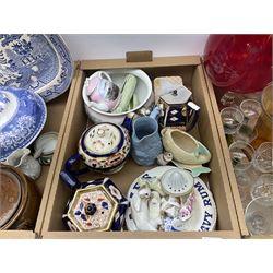 Quantity of assorted glass and ceramics, to include Victorian blue and white Willow pattern platter, and blue and white tureen and cover, teawares decorated in the Imari pallet, large novelty drinking glass with red glass bowl, decanter and stopper, etc., in three boxes 