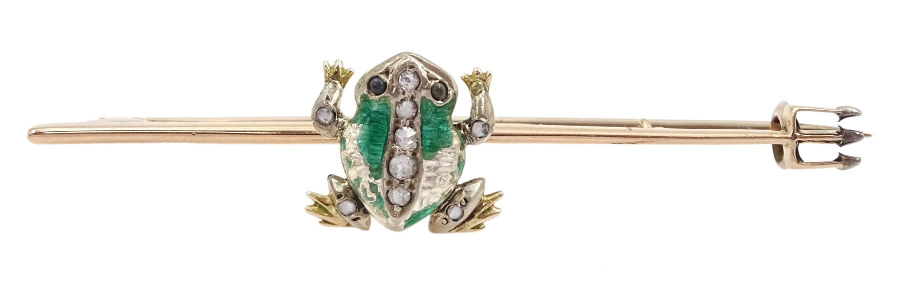 Edwardian frog and spear brooch, the gold and silver green enamel spinning frog set with old cut diamonds and stone set eyes, sat on a gold spear, with registered design number Rd 364025