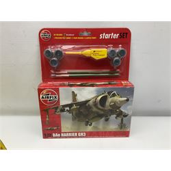 Thirteen unboxed Corgi Aviation Archive or similar die-cast models of aircraft, most with stands; Airfix 1:72 scale construction kit for BAe Harrier GR3; and two boxed Shell Collection die-cast models of cars