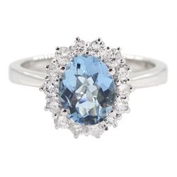 18ct white gold oval aquamarine and round brilliant cut cluster ring, hallmarked, aquamarine approx 1.05 carat, total diamond weight approx 0.40 carat