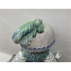 Large Lladro figure, La Menina, modelled as a maid of honor in service, on a mahogany oval base, limited edition 99/1000, sculpted by Jose Puche, with certificate of authenticity, framed and glazed, no 1812, year issued 1996, year retired 2019, H60cm