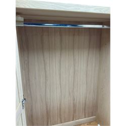 Corndell Furniture - light oak triple wardrobe, enclosed by three panelled doors, one long and one short drawer