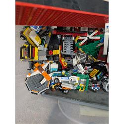 Two boxes of partially built Lego vehicles, including Lego Technics Dumper Truck no. 8264, Titanic, container ships, police boat, smaller police vehicles, etc