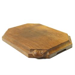 Mouseman - oak chopping board, of canted octagonal form with concave handles, with carved mouse signature, by the workshop of Robert Thompson of Kilburn