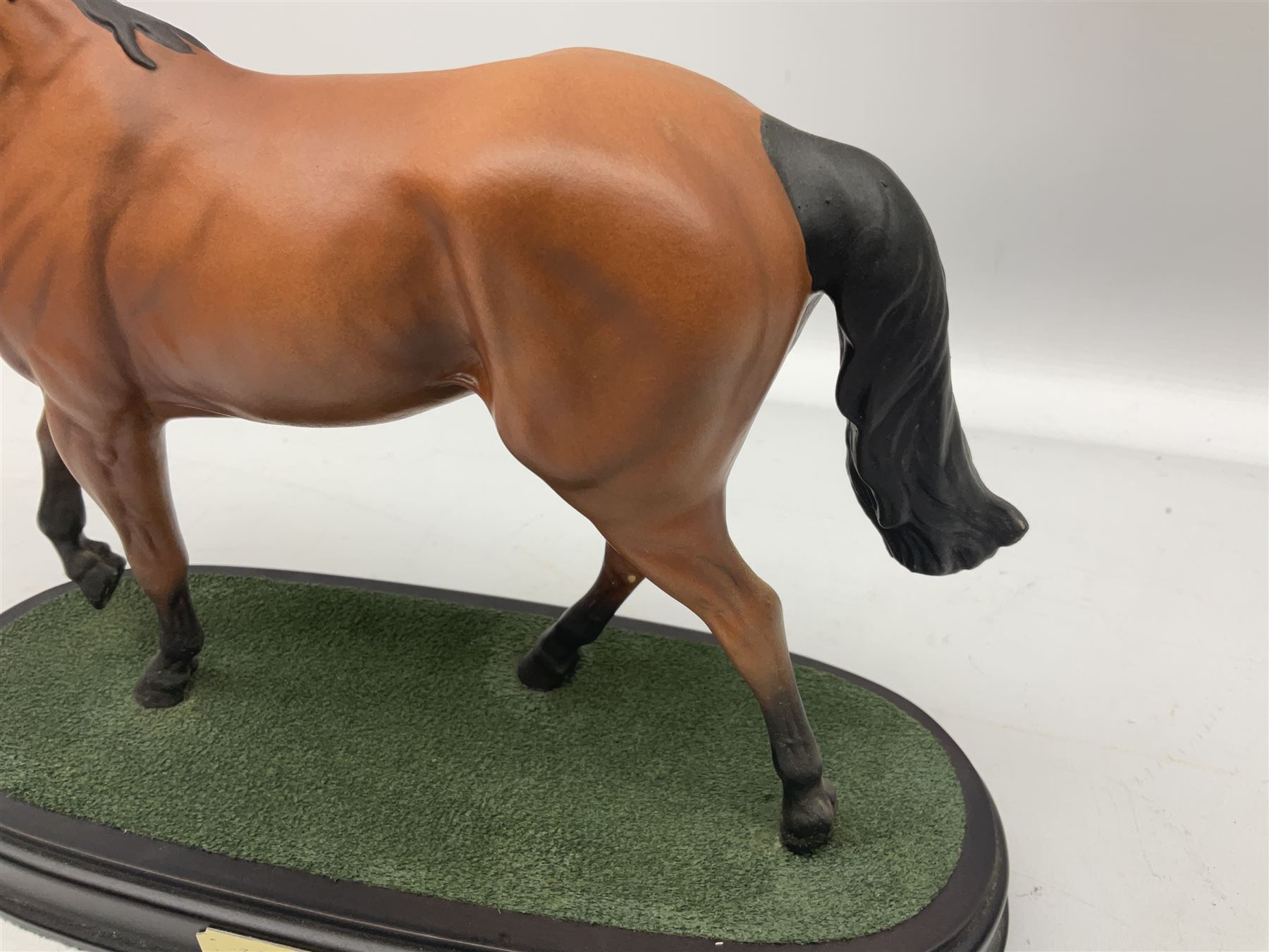 Beswick 'Mill Reef' horse figure, on a wooden plinth together with Beswick Ware horse figure 'Red Rum' on wood plinth, both with printed mark beneath