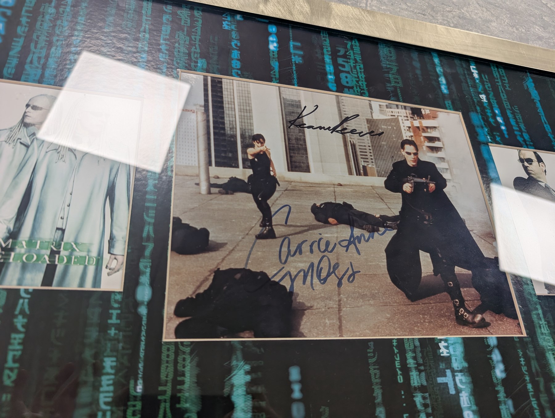 Signed The Matrix montage print with spurious signatures, together with framed Matrix prints and film cells and a limited edition ten DVD box set with bust