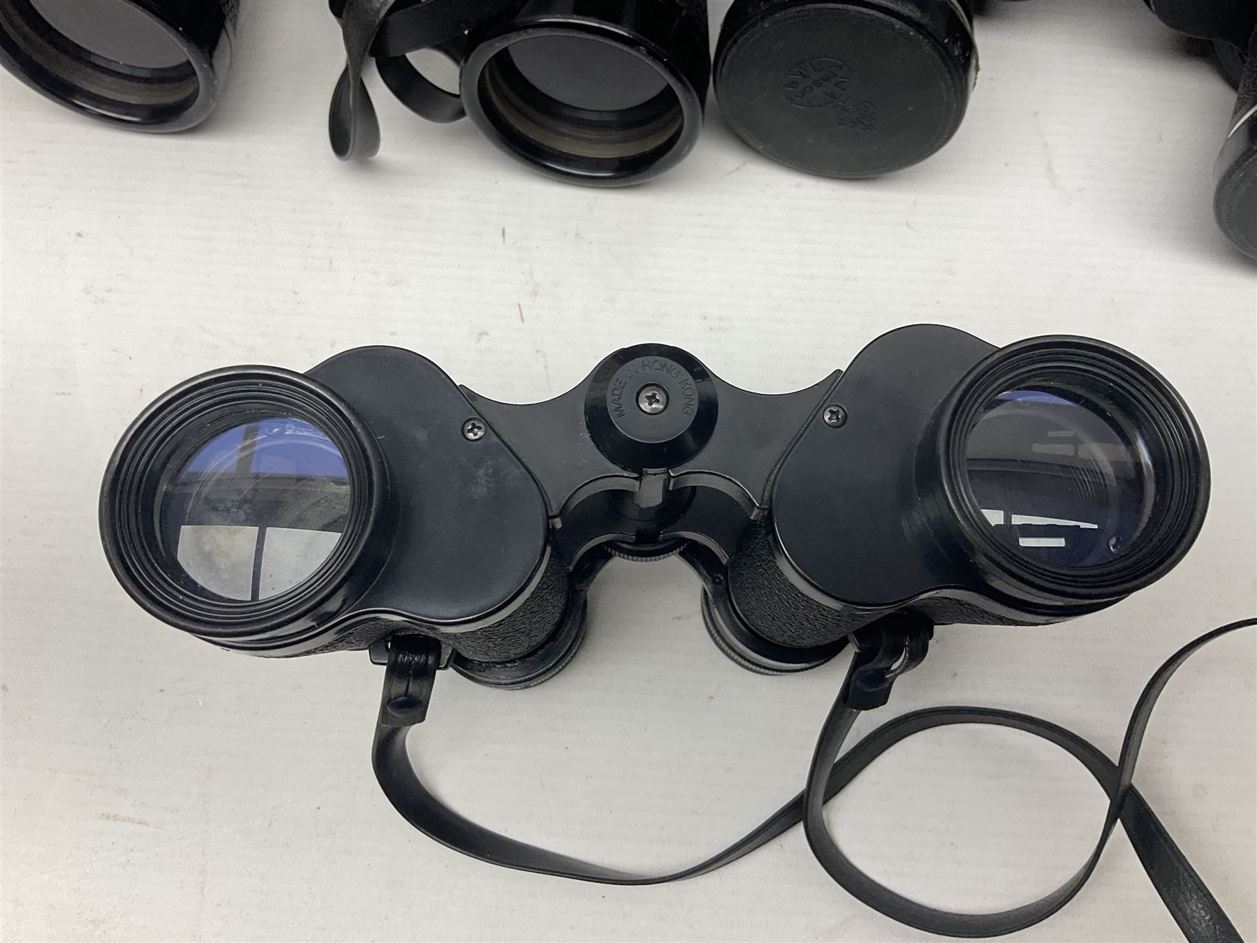 Pair of French binoculars by A.Tubeue Paris, together with three other pairs of binoculars including Telemax 5, Tasco Zip and Hanimax examples and a Panavue automatic slider viewer