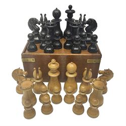 Mid-19th century boxwood and ebony chess set, in mahogany and brass bound box with sliding lid