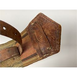 Late 19th century Yemeni Tuza jambiya as worn by religious elite, the 20.5cm curving blade with raised medial ridge, the horn hilt with pique style studwork, in a leather wrapped wooden scabbard with pierced metal mount and leather belt applied with embroidered 'gold' and 'silver' thread work panel; dagger L36cm overall, belt L84cm