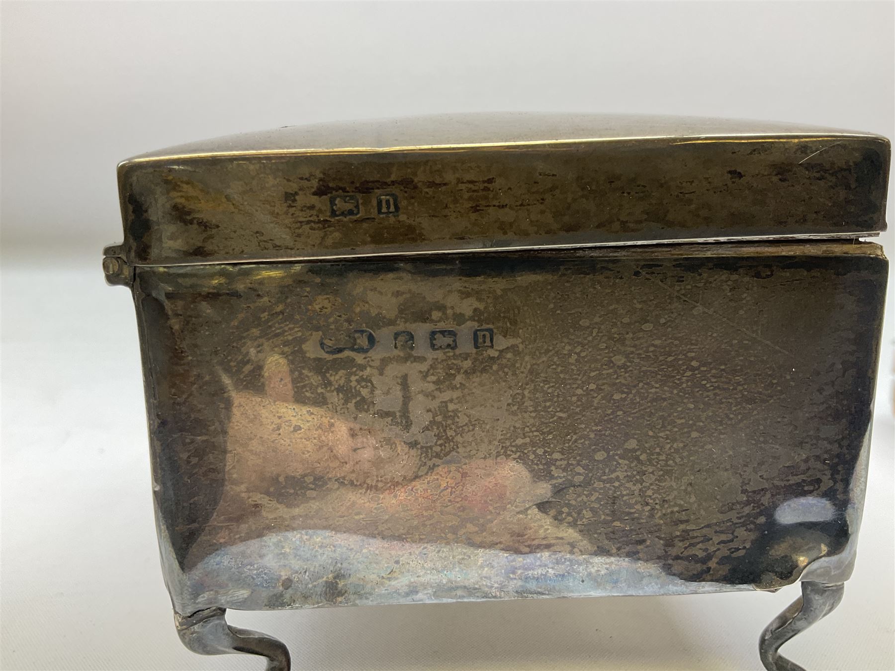 Pocket watch case with hammered silver mounted front, hallmarked Birmingham, together with a silver mounted square box, hallmarked Birmingham 