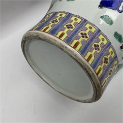 20th century Chinese Famille Rose vase, of baluster form with flared lobed rim and twin figural handles, decorated in polychrome enamel with figures dancing and playing instruments within a garden setting, H42cm